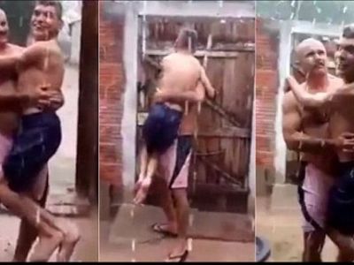 Δείτε το βίντεο που θα σας κάνει να δακρύσετε:Πατέρας κρατάει αγκαλιά τον ανάπηρο γιο του για να νοιώσει τη βροχή (βίντεο)