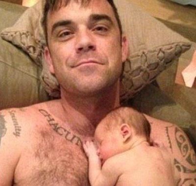 Robbie Williams: Η κόρη μου ακόμη δεν με έχει καταβρέξει!
