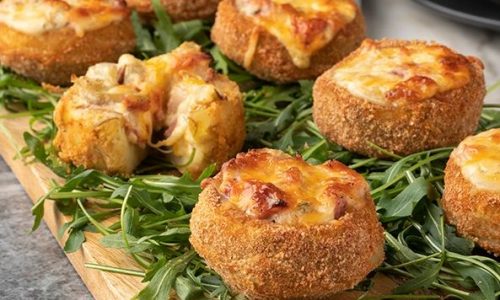 Αγκινάρες γεμιστές με τυρί και μπέικον στον φούρνο