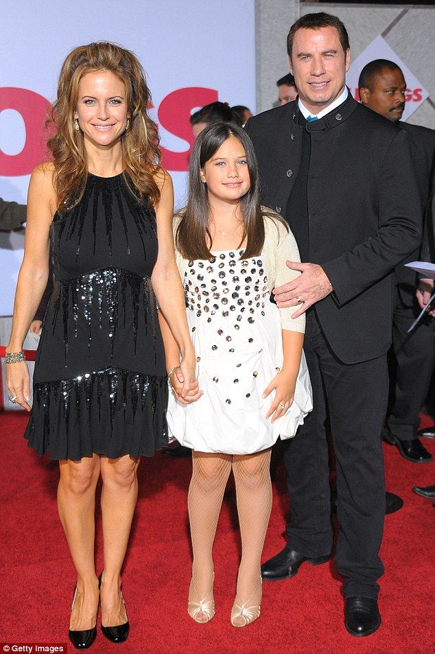 301A8AF300000578 3396529 Brave faces The Saturday Night Fever star with wife Kelly Presto m 17 1452638095723