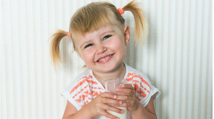 two year old drinking milk 747x415